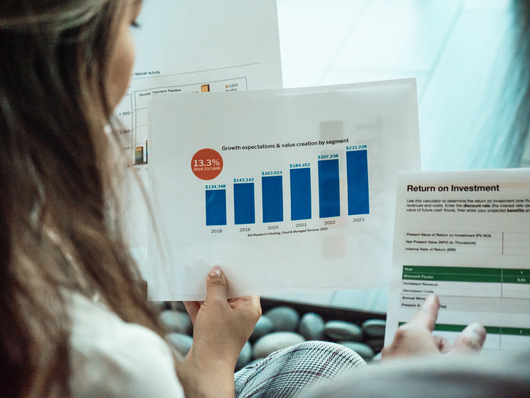 a person reading documents and reports