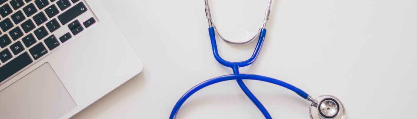 computer desk laptop stethoscope