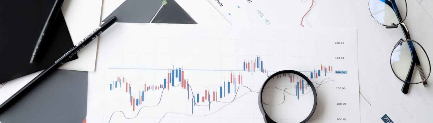 magnifying glass on top of document