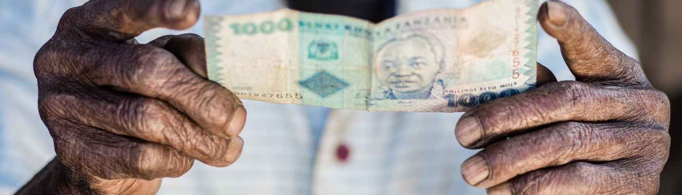 close up photo of person holding banknote